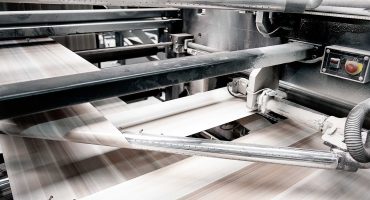 speed-of-offset-print-press-at-work-PUBW2WM.jpg